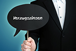 Schriftzug Verzugszinsen in Sprechblase